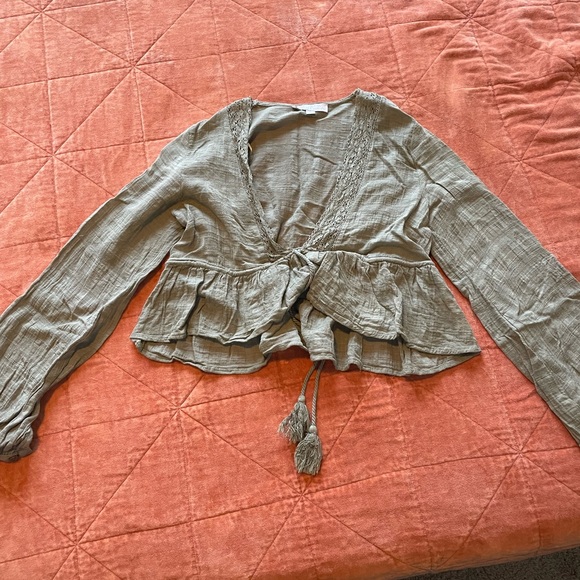 Green front tie cropped long sleeve top. Brand is Mooloola - Picture 1 of 1